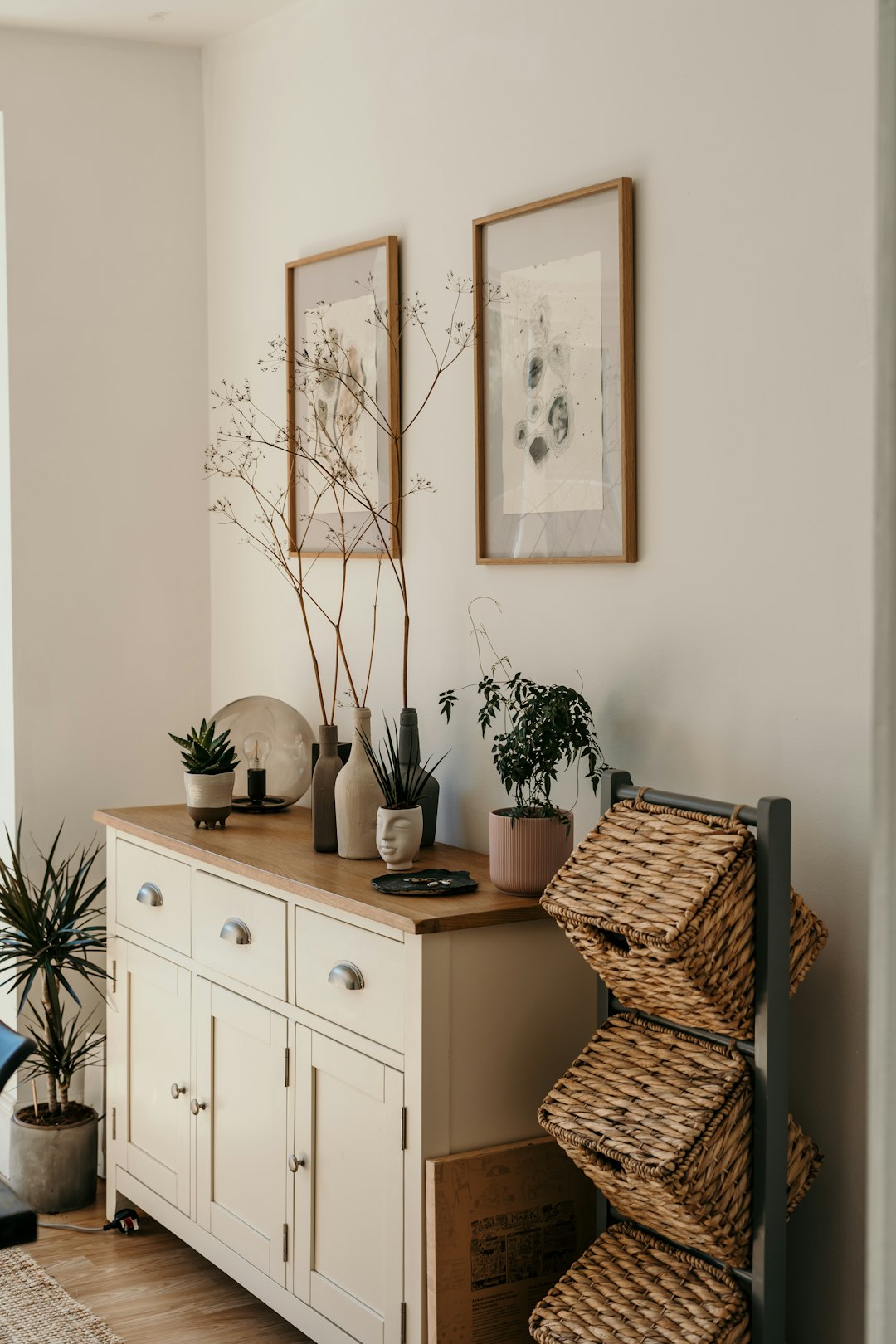 brown-woven-basket-on-white-wooden-cabinet-twonvtstmeu