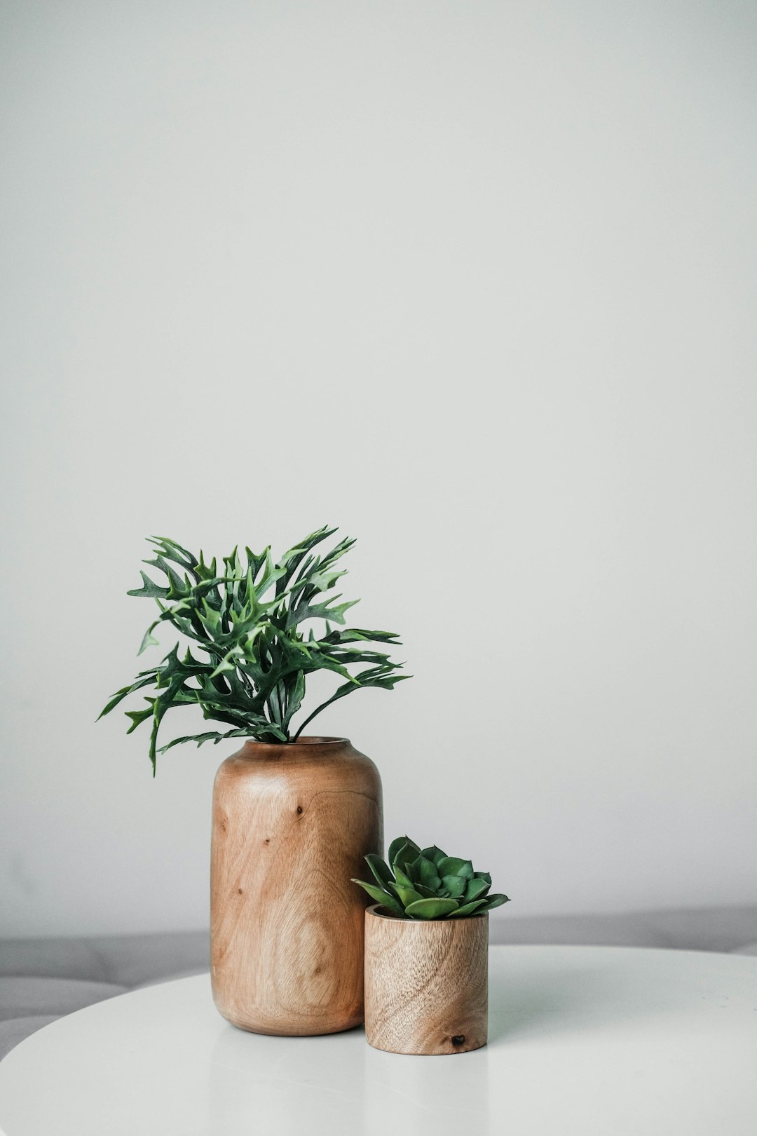 Minimal wooden vase with greenery decoration. I made this piece of decor for my guest bedroom because I love it so much and want to show it off.